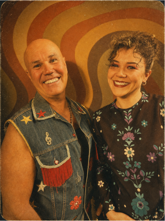 Stephen Fisher-King and Miss Darcy in seventies-inspired performance outfits